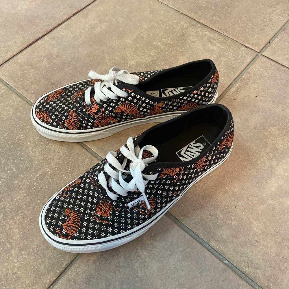 black tiger print vans with white laces